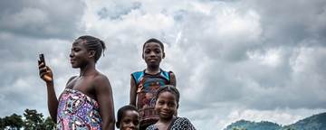 African family - Mother holds phone